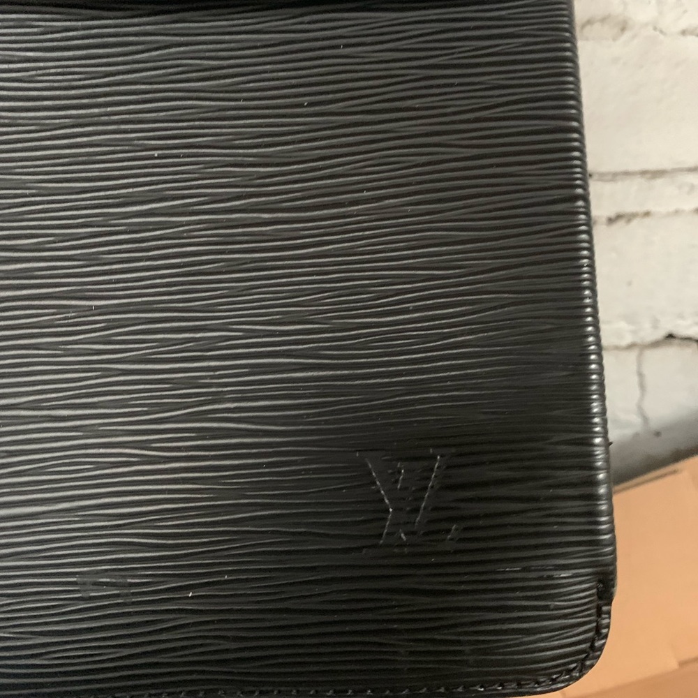 Authentic Black Taiga Leather Louis Vuitton - Picture 3 of 3